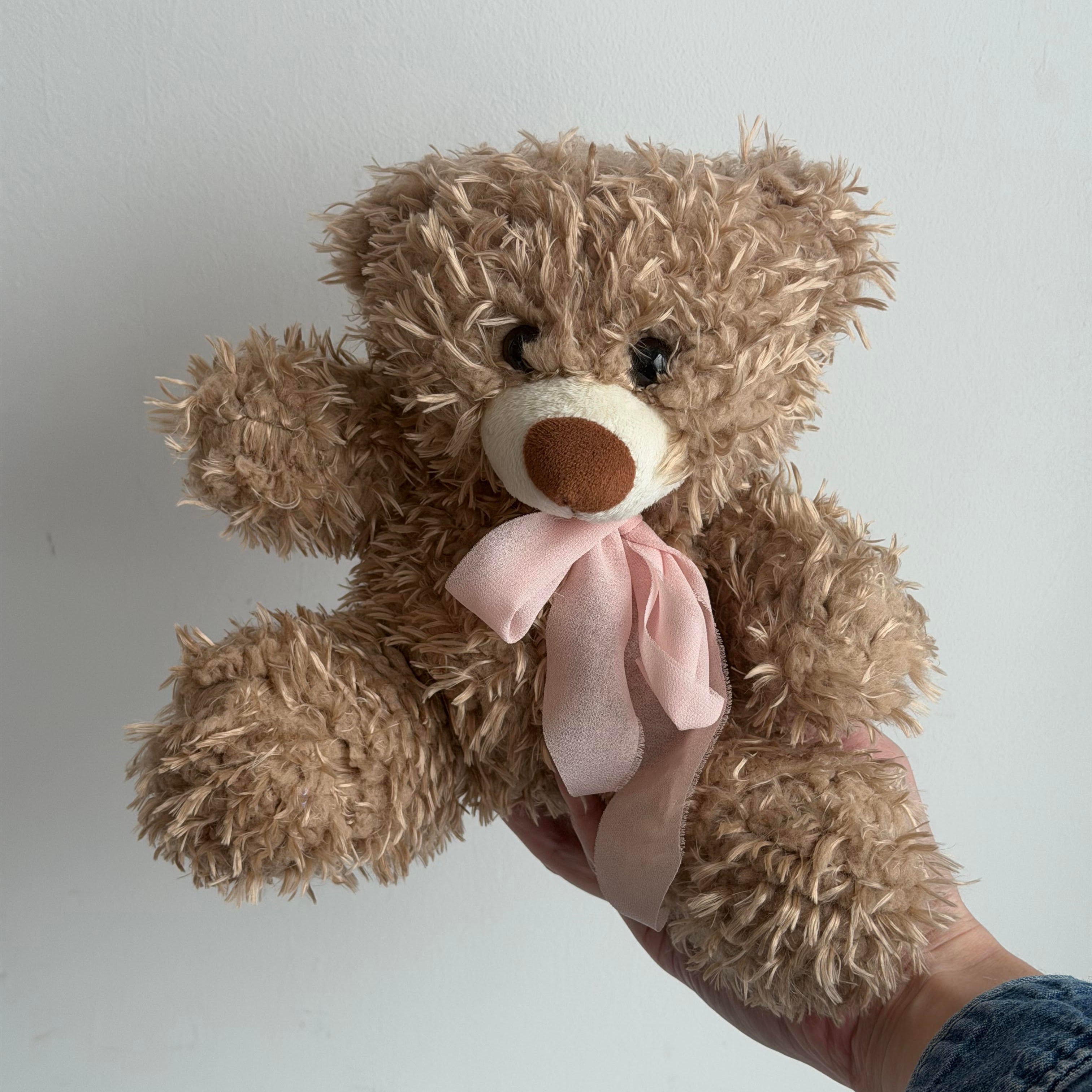 brown teddy bear with light pink ribbon from Lovebird Flowers. London Ontario Florist.